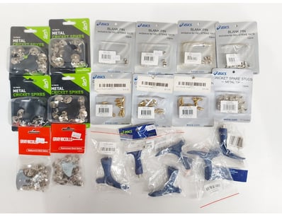 Assortment of metal cricket spikes, blank pins for...