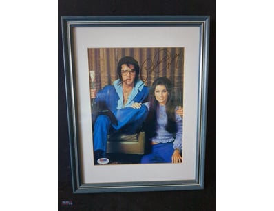 AUTOGRAPHED PHOTOGRAPH OF PRISCILLA PRESLEY.

Item...