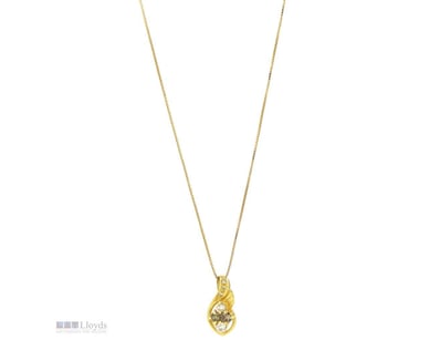 9K/18K YELLOW GOLD AND DIAMOND, PENDANT.      

Th...
