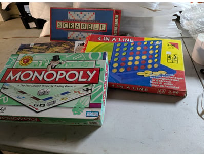 Lot of four classic board games including Monopoly...