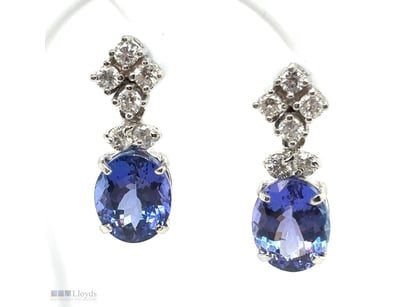 18CT WHITE GOLD TANZANITE AND DIAMOND EARRINGS

Fe...