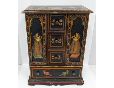 INDIAN LACQUERED CABINET WITH GILT FIGURAL DECORAT...