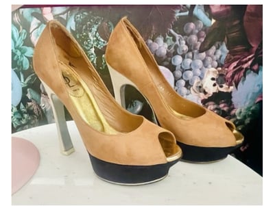 YVES SAINT LAURENT RRP: $1,200
PALAIS PLATFORM 10...