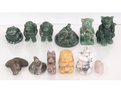 COLLECTION OF TWELVE CARVED JADE AND STONE / CRYST...