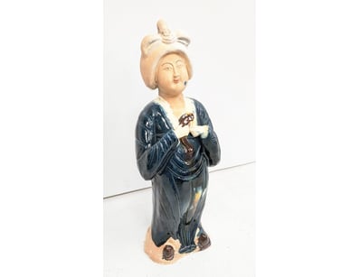 CHINESE CERAMIC FIGURE OF A STANDING WOMAN IN DARK...