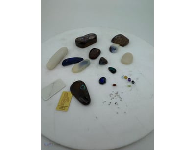 COLLECTIONS OF GEMSTONES, OPALS AND BULLIONS

In...
