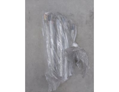Metal rod with pulley attached. Apporximately 10 i...