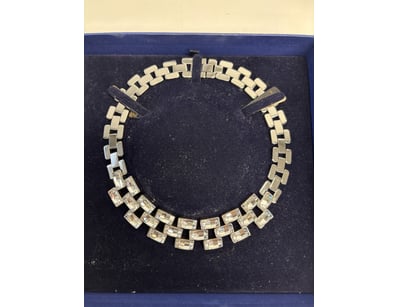 SWAROVSKI CRYSTAL RHODIUM-PLATED NECKLACE

An El...