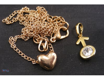GOLD COLOUR PENDANTS/ NECKLACE        

Condition:...