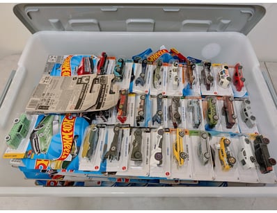 Collection Of 250 Hot Wheel die-cast vehicles in o...