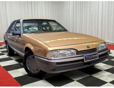 <b>1986 Holden Commodore VL Sedan - Gold - 259,031...
