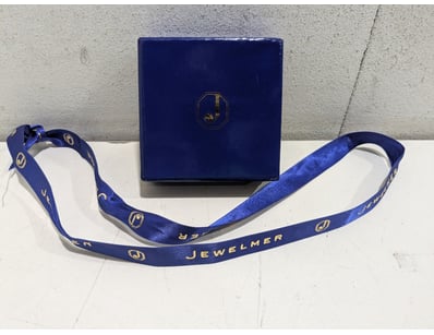 Jewelmer presentation set featuring a round mirror...