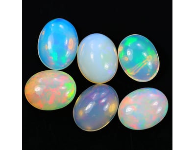 7.04 CARATS CERTIFIED NATURAL OPAL

Weight : 7.0...