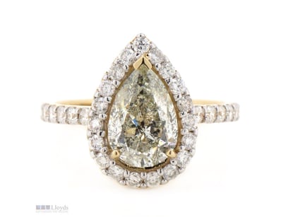 14K YELLOW GOLD AND DIAMOND, HALO RING.      

The...