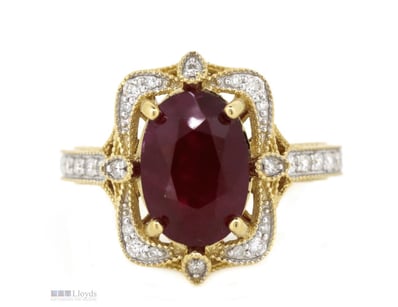 THE CENTRE FEATURES, ONE OVAL MIXED CUT, DARK RED,...