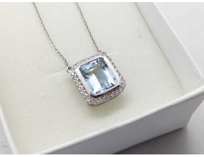 14CT WHITE GOLD AQUAMARINE AND DIAMOND NECKLACE
...