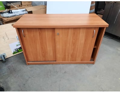 Cabinet with sliding door and one shelf on each si...