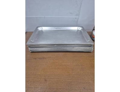Lot of oven baking trays

Sold as lot