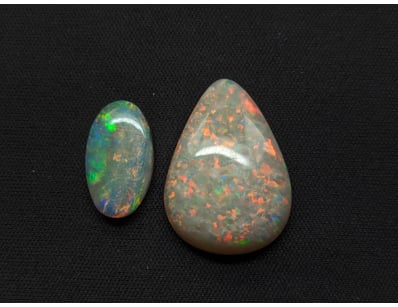 10.34 TCW SEMI DARK OPALS

Includes 8.32Ct Drop ...
