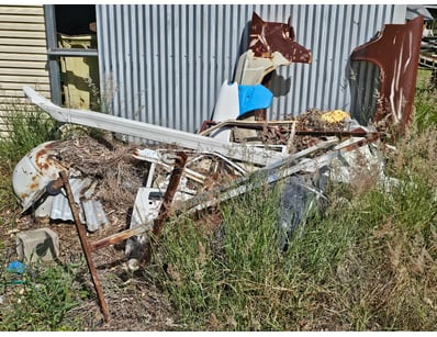 Assorted car parts, including door, side panel, ax...