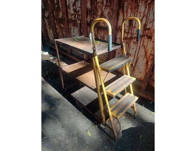 Industrial steel cart or trolley featuring three t...