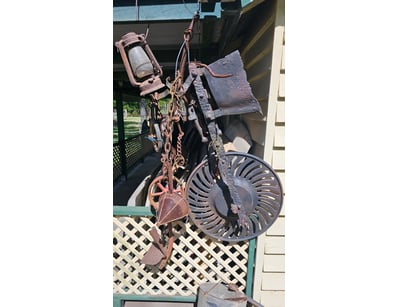 Assorted metal tools, including lantern, strainer,...