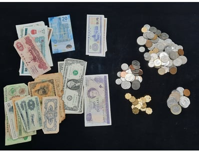 COLLECTION OF WORLD COINS AND BANK NOTES.

Inclu...