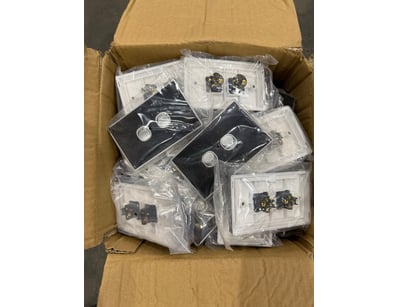 Bulk lot of electrical wall plates and switches in...