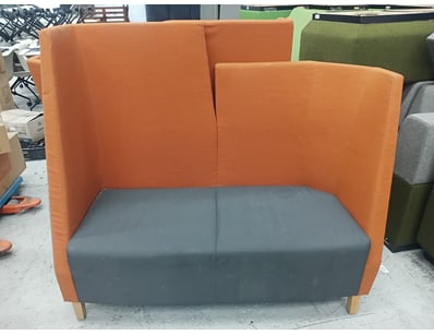Modern two-seater booth seating featuring a striki...