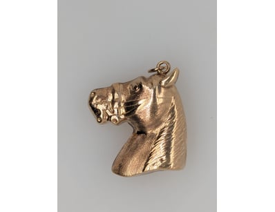9CT YELLOW GOLD HORSE HEAD PENDANT


583010+111...
