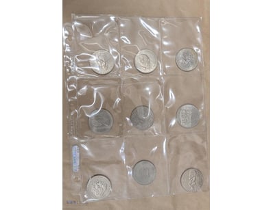 COIN COLLECTION OF NINE LARGE CROWN SIZE COINS. AU...