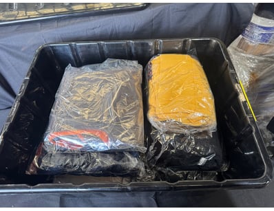 Assorted box of pants and shirts in various sizes ...