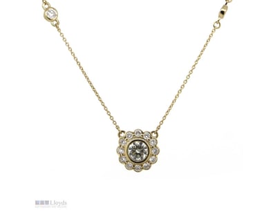 14K YELLOW GOLD AND DIAMOND, NECKLACE.      

The ...