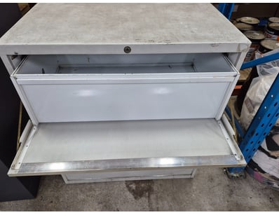 Filing cabnet with three drawers, grey finish.

Di...