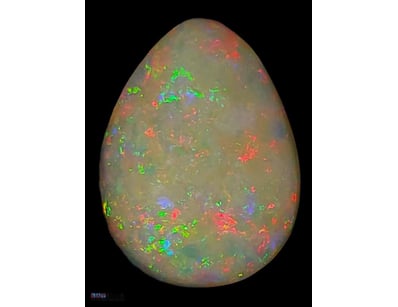 14 CARATS COOBER PEDY DARK BASED WHITE OPAL.    

...