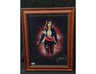 THIS IMAGE DEPICTS A FRAMED, AUTOGRAPHED PHOTO OF ...