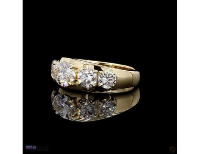 3.34 CT OVAL & ROUND FIVE-STONE RING IN 18KT YELLO...