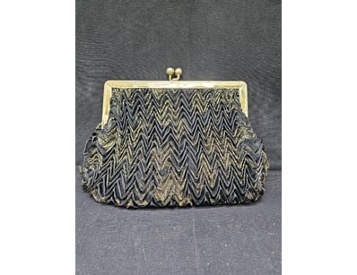 BLACK AND GOLD COLOURED CLUTCH.

Item Size: Heig...
