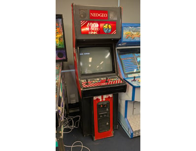 Neo Geo MVS arcade cabinet in red and black livery...