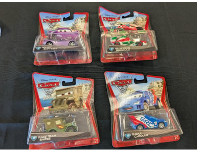 DISNEY,PIXAR CARS 2

1X Raoul Caroule 
1X Race ...
