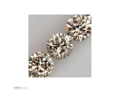 0.08 TCW LIGHT BROWN ROUND 3 DIAMOND        

Cond...