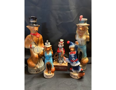 COLLECTION OF FIVE VINTAGE JIM BEAM CERAMIC DECANT...