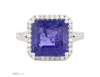 14K WHITE GOLD, TANZANITE AND DIAMOND, HALO RING. ...