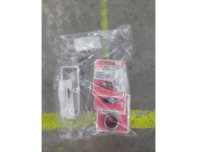<p><strong>Cigarette Lighter Bezel, Tray, and Coat...
