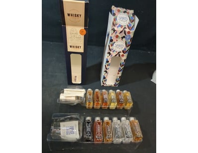 Premium curated tasting kit collection featuring t...