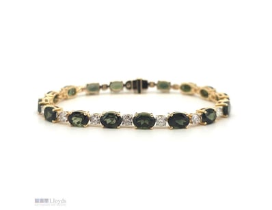 14CT YELLOW GOLD TOURMALINE AND DIAMOND LINE BRACE...