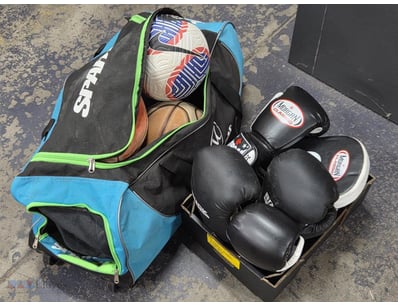 Sports equipment, including assorted balls, boxing...