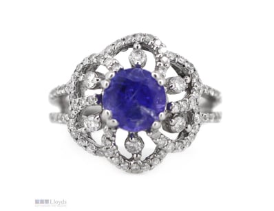 14K WHITE GOLD, TANZANITE AND DIAMOND, FLORAL RING...