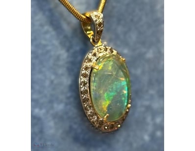 9K YELLOW GOLD, 6CT DOUBLET OPAL, 0.50CT DIAMOND P...