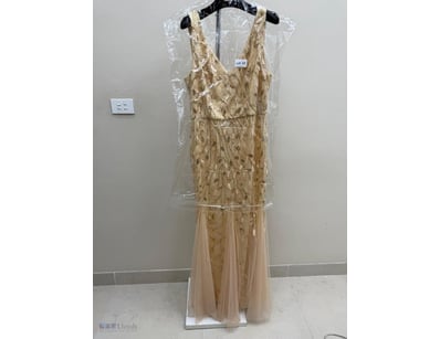 BEADED EVENING GOWN IN CHAMPAGNE SILK

Item Size: ...
